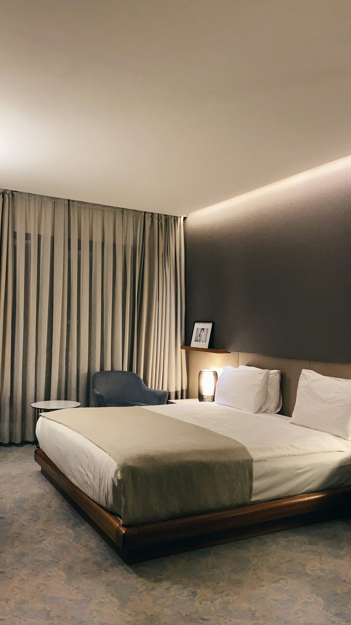 Bright, well-lit hotel room ready to welcome guests